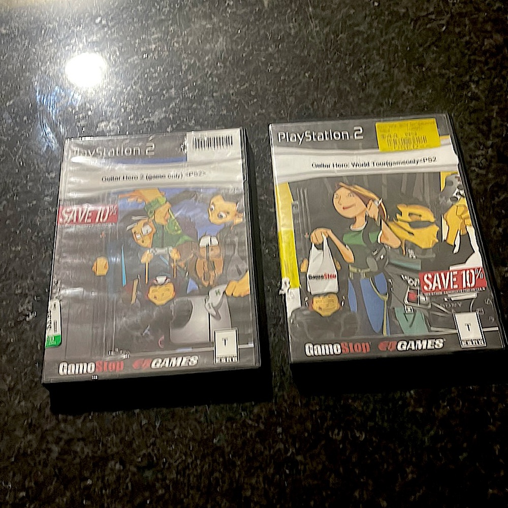 PlayStation 2 guitar hero games only (both)